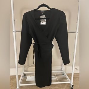 Long sleeved, black, wrap dress with tie in back